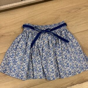Trotters London girl’s Floral Blue Skirt with Velvet Bow